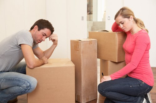 Professional movers loading household items in Harrowweald